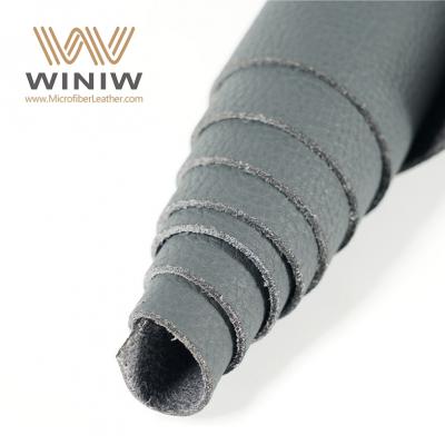 الصين الرائدة 1.2mm Microfiber PU Leather Fabric Automotive Interior Material المورد